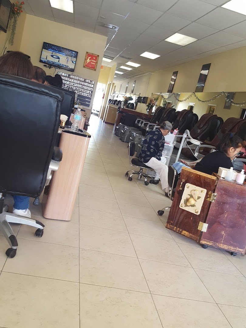 Nail salon interior with manicure stations.